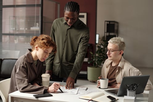 gen z employees meeting at work
