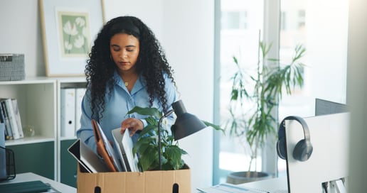 Employee gathering belongings after quitting