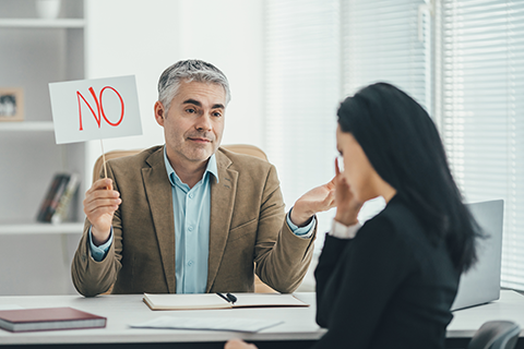 AdobeStock_256605146 - bad boss saying no LOW