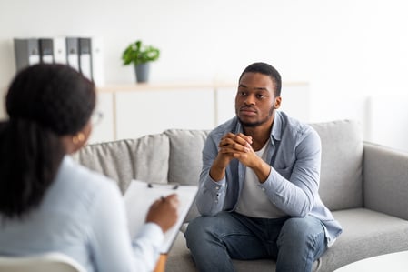 patient talking with mental health therapist