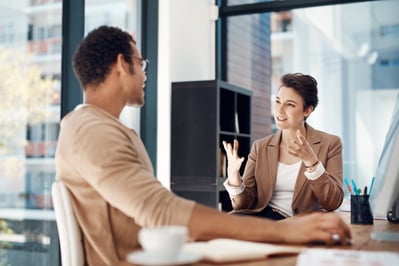Manager meeting with her employee