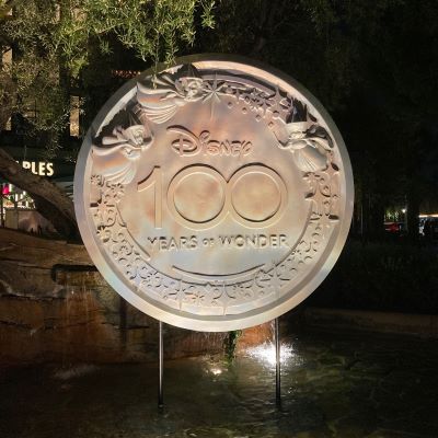 Disneyland's 100 Year Celebration Features Special Decorations like this Platinum Coin