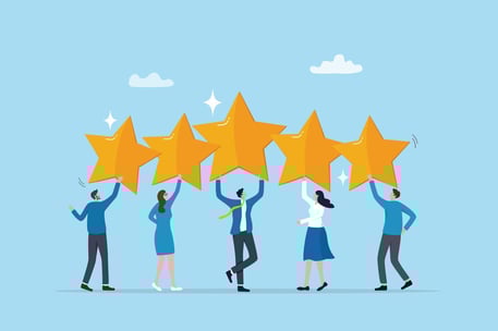 people hold up stars in employee recognition